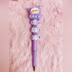 Purple beaded pen with  Kuromi figure.